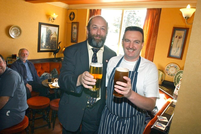 Trevor Wraith right, with Mick Moss, Regional Director, Yorkshire, of CAMRA at Trevor's pub, the Kelham Island Tavern, Yorkshire Pub of the Year in 2004