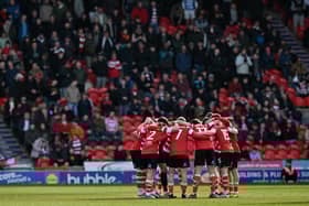 Doncaster Rovers' players performed a pre-match huddle prior to seeing off Newport.