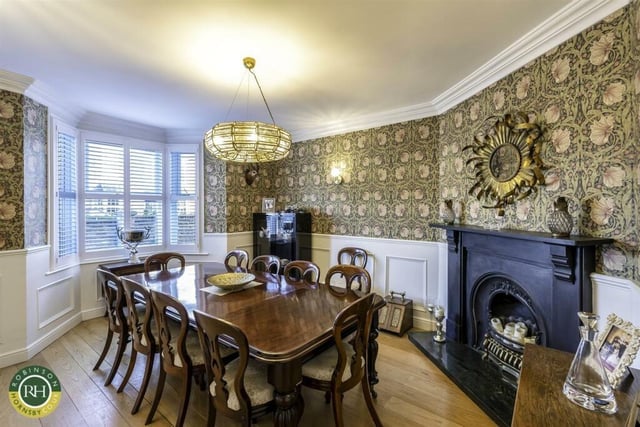 The dining room, with feature fireplace.