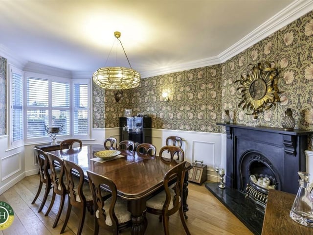 The dining room, with feature fireplace.