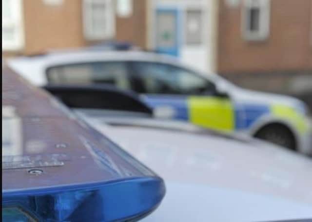 Police cars attend an incident.