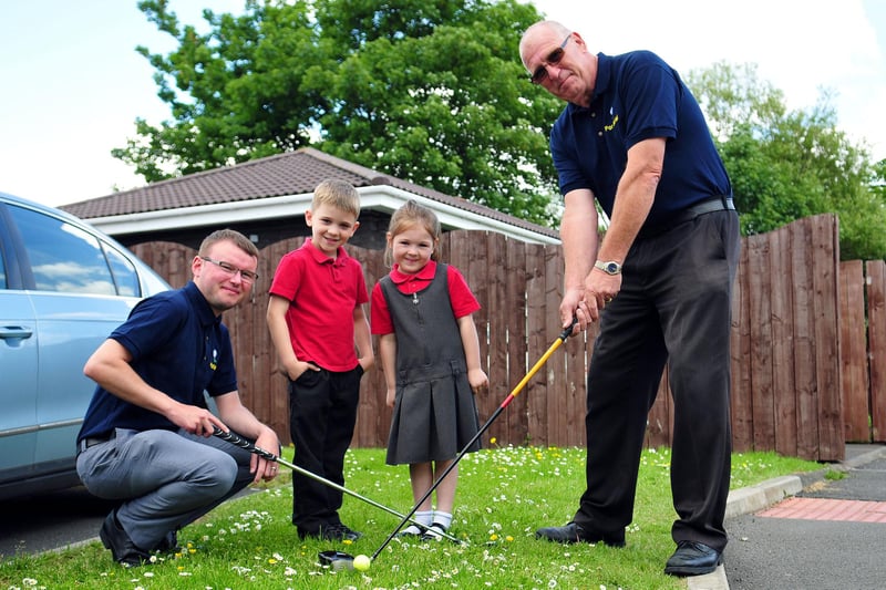 Stranton Primary School pupils Keane Pierse and Lucy Relton look on with David Miller (IT manager) as site manager Brian Ward is about to tee off. Who can tell us more?