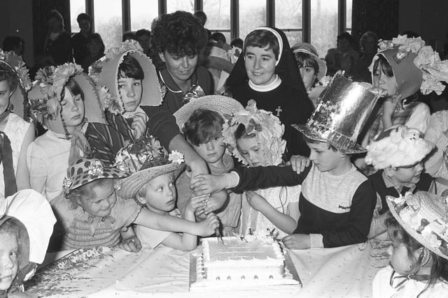 Eileen Blake, one of the first pupils at English Martyrs Primary School, Southwick cuts a cake to celebrate the school's silver jubilee. She is pictured with some of the pupils and headmistress, Sister Dolores. Remember this from 1984?