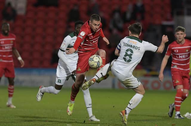 Tommy Rowe in action against Plymouth Argyle. Picture: Howard Roe/AHPIX LTD