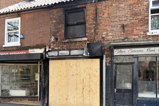 The business on King Street, which was set on fire after a Car crashed into the front.  Picture: NDFP-04-05-21-ThorneFire 2-NMSY