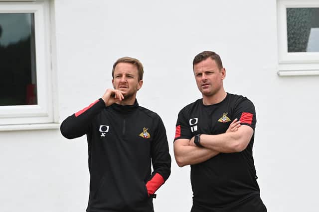 James Coppinger and Richie Wellens oversee training