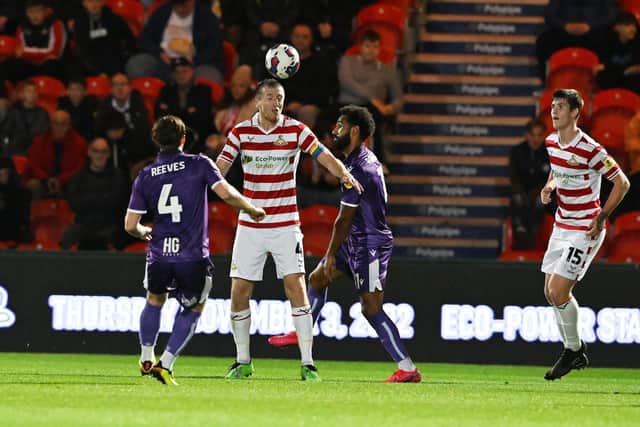 Tom Anderson is one of three players who could return for Doncaster Rovers when they take on Harrogate Town.