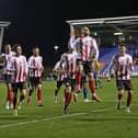 Alex Pritchard celebrates scoring for Sunderland at Shrewsbury.