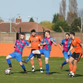 Askern Miners, in red and blue, in action against Harworth Colliery. Photo: John Mushet