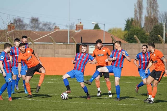 Askern Miners, in red and blue, in action against Harworth Colliery. Photo: John Mushet
