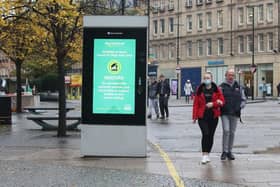 Coronavirus warning sign in Sheffield city centre.