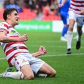 Doncaster Rovers are being given a 13 per cent chance of promotion.