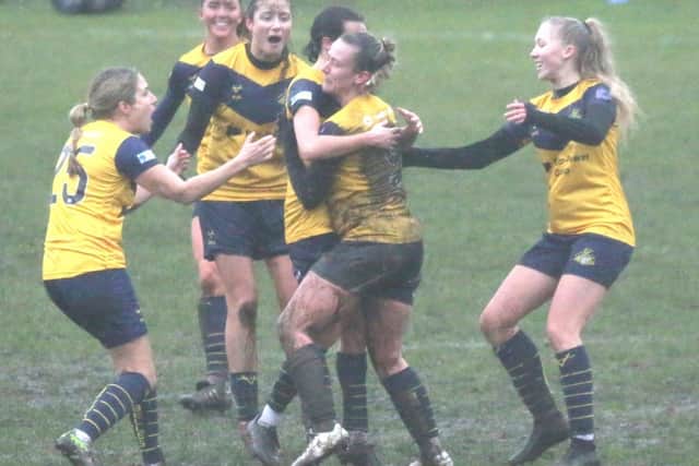 Belles celebrate their late equaliser against York.