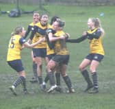 Belles celebrate their late equaliser against York.