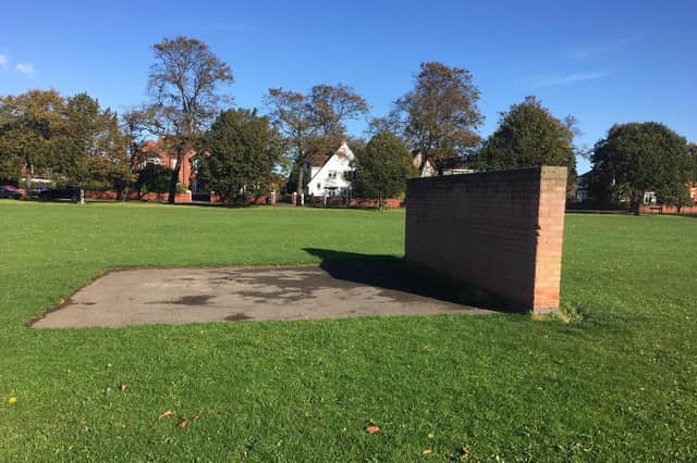 Small brick wall on Town Fields - what is its use?