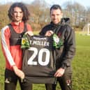 New Doncaster Rovers signing Todd Miller with head coach Danny Schofield. Photo: Heather King/Doncaster Rovers.