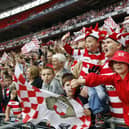 Doncaster Rovers supporters celebrate after beating Leeds United during the Football League One play-off final on May 25, 2008.