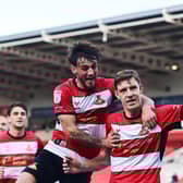 Joe Ironside celebrates his penalty with Tom Nixon.