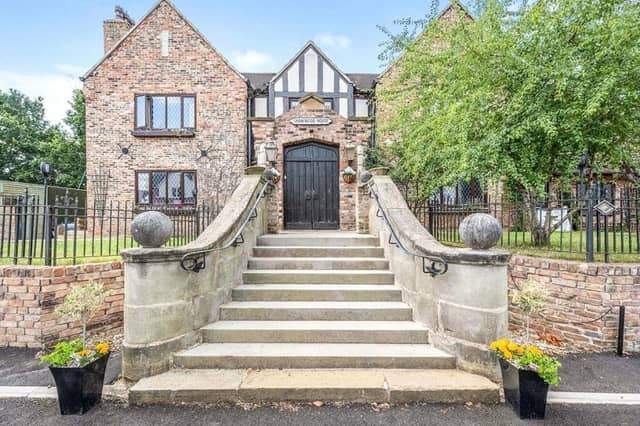 The impressive front aspect of the imposing property.