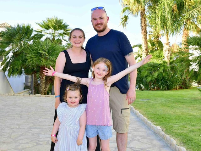 Brighter times: Harper on a family holiday, following treatment.