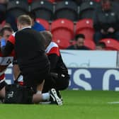 Doncaster Rovers defender Tom Anderson suffered a concussion in the draw against Mansfield Town.