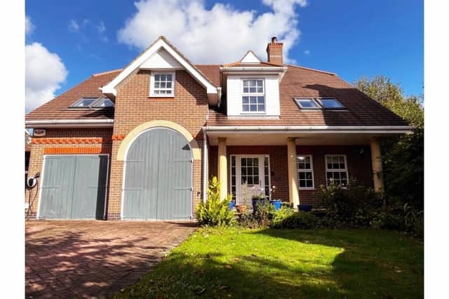 The distinctive Belton home sits at the head of a cul-de-sac and has a private rear garden.