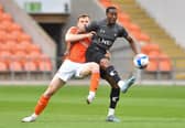 Fejiri Okenabirhie in action against Blackpool in May 2021.