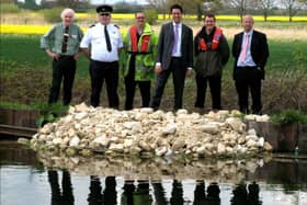 Officials at the opening of one of the deer ramps at Thorne. Picture: Canal and River Trust