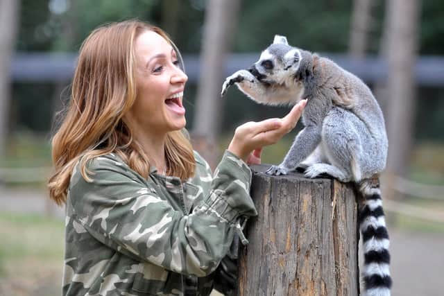 14 August 2018     Actress Lucy Jo Hudson amongst the lemurs during filming the Big Week At the Zoo at Yorkshire Wildlife Park . Picture Tony Johnson.