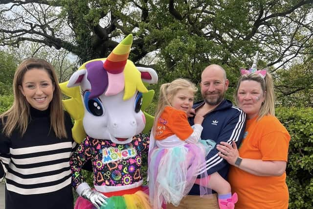Doncaster Central MP Sally Jameson with Bea and her family in Sandall Park.