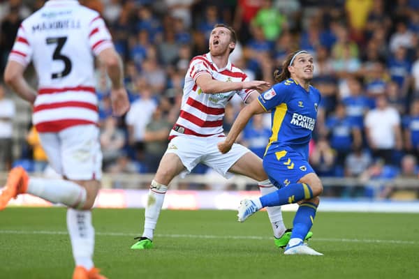 Doncaster's Tom Anderson will miss Saturday's trip to Northampton through injury.