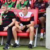 Doncaster Rovers boss Grant McCann (centre) and his assistant Cliff Byrne.