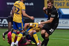 Joe Ironside celebrates his goal in Doncaster Rovers' EFL Trophy clash at Mansfield Town.