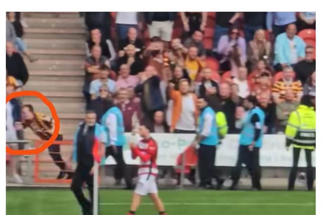 The unfortunate Bradford City fan takes a tumble while hurling insults at Doncaster Rovers winger Jordan Gibson. (Video: Ian Ashman).