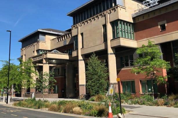 Sheffield Crown Court, pictured, heard how a South Yorkshire thug attacked his partner and threatened her mother.