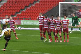 Harry Pickering curls in the match winning free kick for Crewe against Rovers. Picture: Andrew Roe/AHPIX