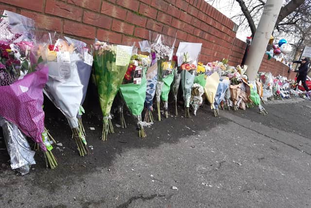 Flowers in memory of shooting victim Lewis Williams on Wath Road
