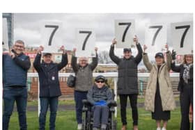 Rob Burrow received a donation of £77,777 at Doncaster Races.