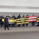 A small group of disgruntled Rovers fans held a protest about the running of the club before Monday's game.