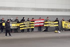 A small group of disgruntled Rovers fans held a protest about the running of the club before Monday's game.