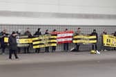 A small group of disgruntled Rovers fans held a protest about the running of the club before Monday's game.