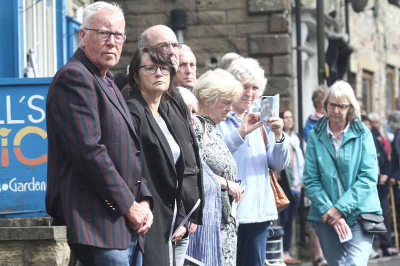 The community lined the street to pay their respects