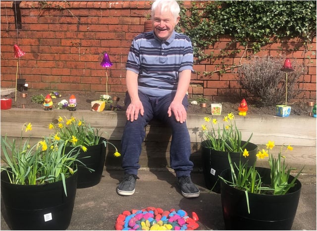 David Jepson of Harry Priestley House with the donated flowers.