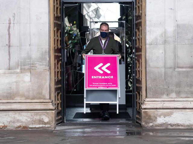 Putting out signs and barriers is , Gareth James, Museum Manager.