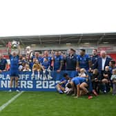 The Dons celebrate promotion. Picture: Howard Roe/AHPIX.com