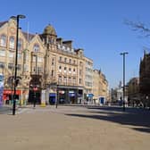 A view towards Fargate in Sheffield shows how shoppers are following the rules