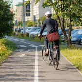 Cycling helps keep us healthy and helps towards the impact on climate change. Photo: Adobe