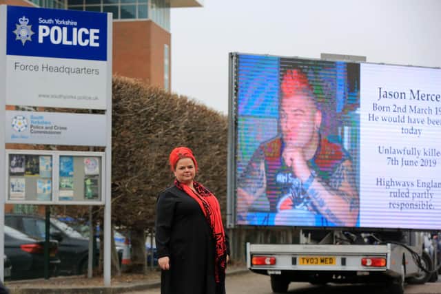 Claire Mercer marked her late husband’s birthday by arranging a giant mobile screen to be outside South Yorkshire Police’s headquarters calling on the force to prosecute Highways England over smart motorways. Picture: Chris Etchells