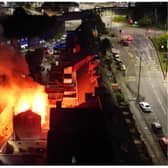 Footage shows flames tearing through the building in Bentley. (Photo: Jason Richards/The Ground Below)