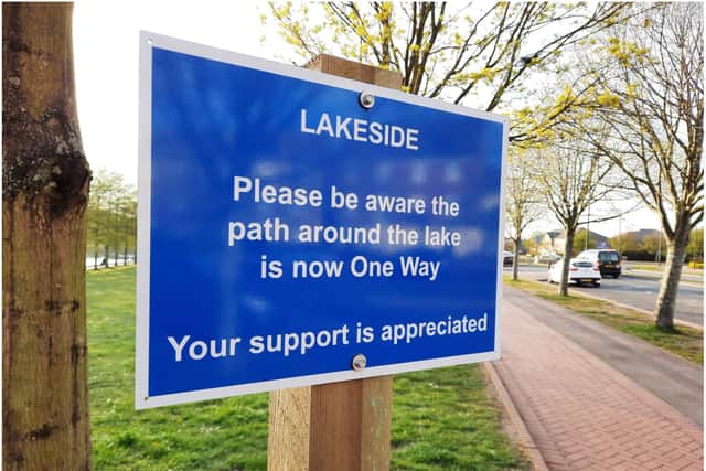 Signs were installed at Lakeside instructing walkers to walk one way.
